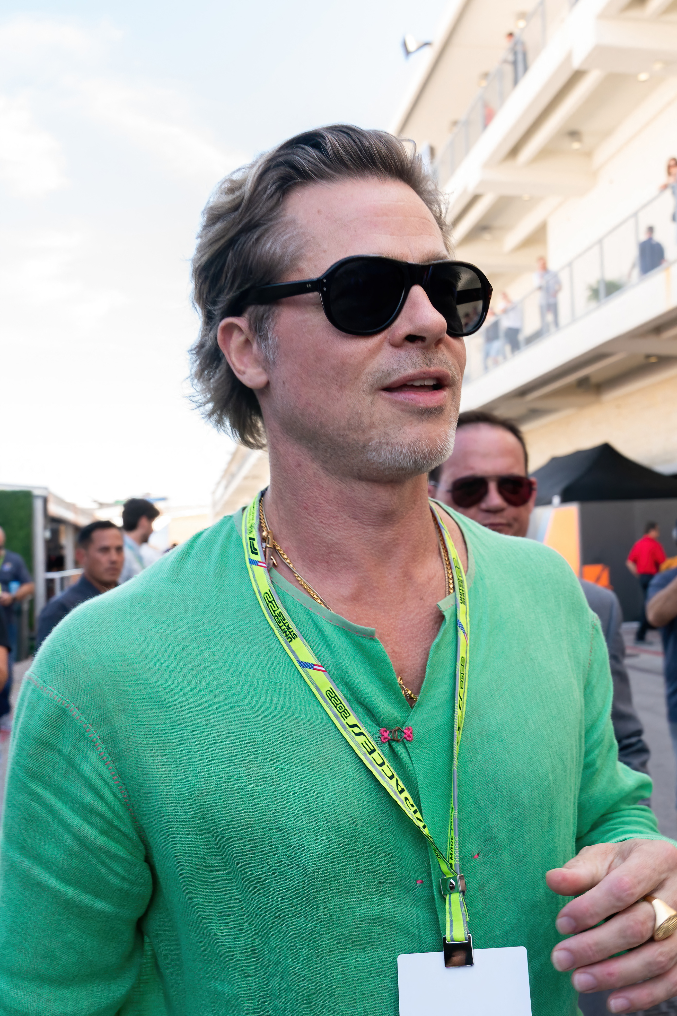 US actor Brad Pitt tours the paddock before the Formula One United States Grand Prix 3rd practice session at the Circuit of the Americas in Austin, Texas, on October 22, 2022. SUZANNE CORDEIRO / AFP