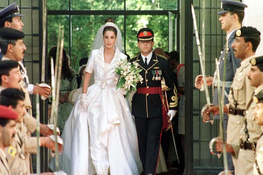 Picture dated 10 June 1993 shows Jordanian Crown Prince Abdullah and his wife Rania on their wedding day in Amman. RABIH MOGHRABI / AFP