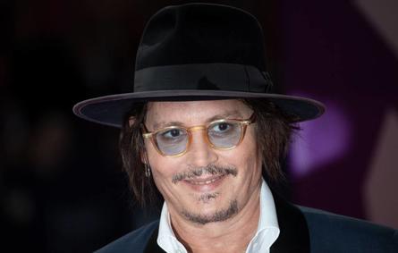 US actor Johnny Depp arrives on the red carpet of the 47th Deauville US Film Festival in Deauville, western France, on September 5, 2021. LOIC VENANCE / AFP