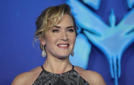 British actress Kate Winslet poses on the red carpet upon arrival for the World Premiere of the film "Avatar: The Way of Water" in London on December 6, 2022. ISABEL INFANTES / AFP