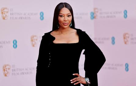 British model Naomi Campbell poses on the red carpet upon arrival at the BAFTA British Academy Film Awards at the Royal Albert Hall, in London, on March 13, 2022. Tolga Akmen / AFP