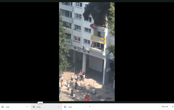 بالفيديو إنقاذ طفلين بعد قفزهما من نافذة شقتهما المحترقة