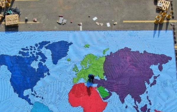 غينيس تسجل مبادرة صنع خارطة للعالم باستخدام أغطية بلاستيكية في موسوعتها