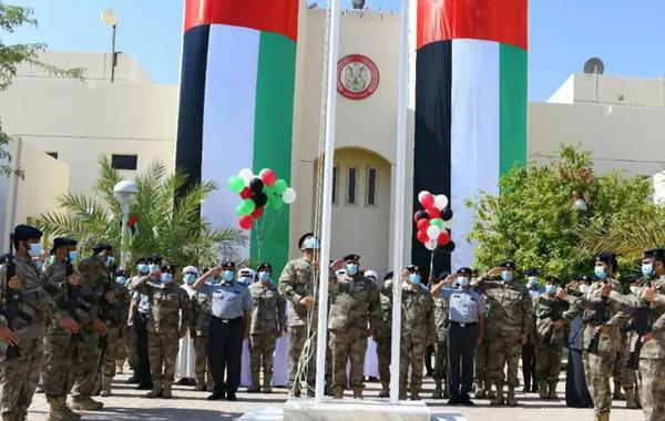 احتفال شرطة أبو ظبي بيوم العلم - الصورة من حساب شرطة أبو ظبي على تويتر