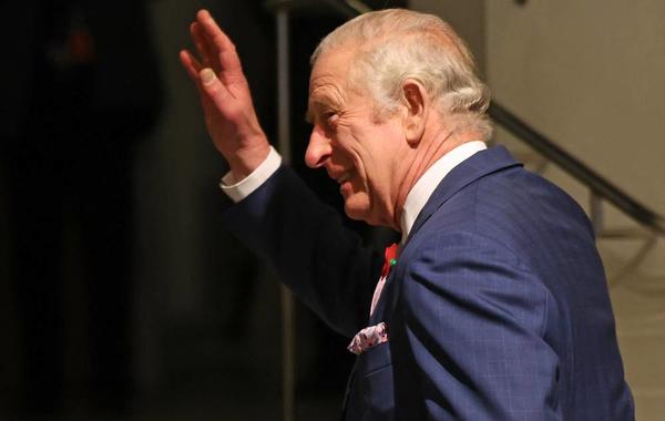 Britain's King Charles III waves as he arrives at the Victoria and Albert Museum, to visit the Africa Fashion exhibition in London, on November 3, 2022. Africa Fashion is a landmark exhibition celebrating the creativity, ingenuity and global impact of African fashion.ISABEL INFANTES / AFP