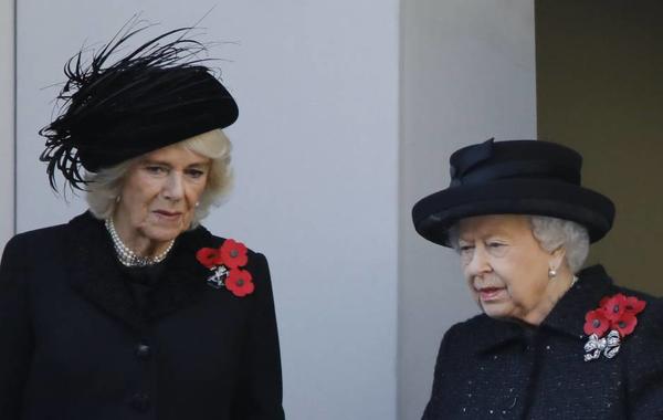 Britain's Queen Elizabeth II (R) talks with Britain's Camilla, Duchess of Cornwall (L) as they attend the Remembrance Sunday ceremony at the Cenotaph on Whitehall in central London, on November 10, 2019. Remembrance Sunday is an annual commemoration held on the closest Sunday to Armistice Day, November 11, the anniversary of the end of the First World War and services across Commonwealth countries remember servicemen and women who have fallen in the line of duty since WWI. Tolga AKMEN / AFP