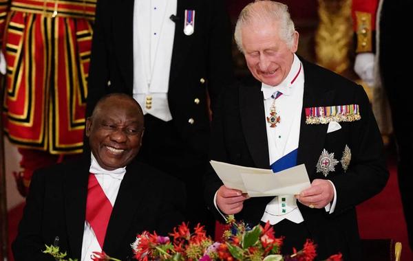 South Africa's President Cyril Ramaphosa listens as Britain's King Charles III speaks during a State Banquet at Buckingham Palace in London on November 22, 2022, at the start of the President's of South Africa's two-day state visit. King Charles III hosted his first state visit as monarch on Tuesday, welcoming South Africa's President to Buckingham Palace. Aaron Chown / POOL / AFP