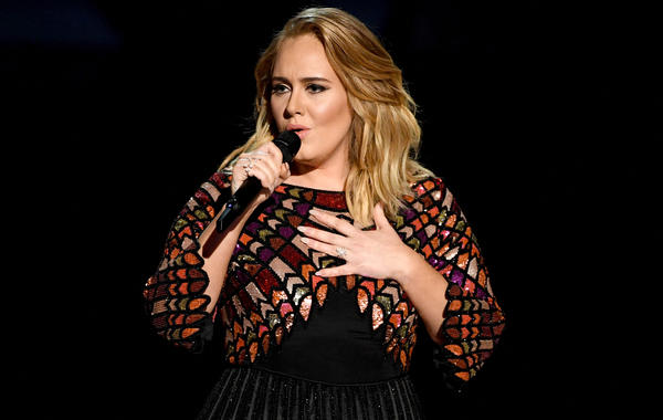 LOS ANGELES, CA - FEBRUARY 12: Recording artist Adele performs onstage during The 59th GRAMMY Awards at STAPLES Center on February 12, 2017 in Los Angeles, California. Kevin Winter/Getty Images for NARAS/AFP KEVIN WINTER / GETTY IMAGES NORTH AMERICA / Getty Images via AFP