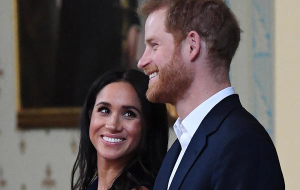  Britain's Prince Harry and Meghan, Duchess of Sussex attend a reception at Government House in Melbourne on October 18, 2018.  JULIAN SMITH / POOL / AFP