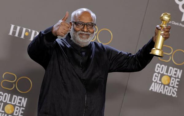 M. M. Keeravani poses with the Best Original Song award for "Naatu Naatu" for "RRR" in the press room during the 80th Annual Golden Globe Awards at The Beverly Hilton on January 10, 2023 in Beverly Hills, California. Amy Sussman/Getty Images/AFP
