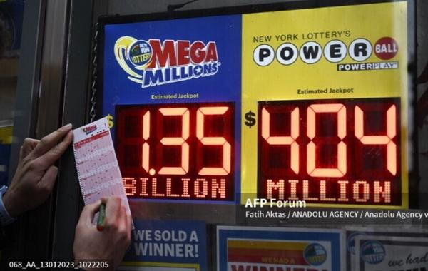 NEW YORK, USA -  January 12, 2023. Today's Mega Millions jackpot hits $1.35 billion as its 2nd largest in history.  Fatih Aktas / ANADOLU AGENCY / Anadolu Agency via AFP