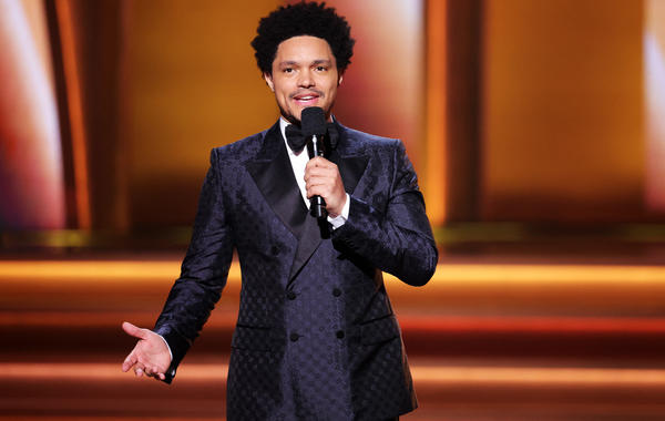  Host Trevor Noah speaks onstage during the 64th Annual GRAMMY Awards at MGM Grand Garden Arena on April 03, 2022 in Las Vegas, Nevada. Rich Fury/Getty Images for The Recording Academy/AFP Rich Fury / GETTY IMAGES NORTH AMERICA / Getty Images via AFP