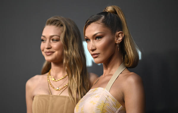 US models Gigi Hadid (L) and Bella Hadid arrive for the 2019 MTV Video Music Awards at the Prudential Center in Newark, New Jersey on August 26, 2019. Johannes EISELE / AFP