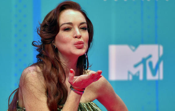 Lindsay Lohan poses on the red carpet ahead of the MTV Europe Music Awards at the Bizkaia Arena in the northern Spanish city of Bilbao on November 4, 2018. ANDER GILLENEA / AFP