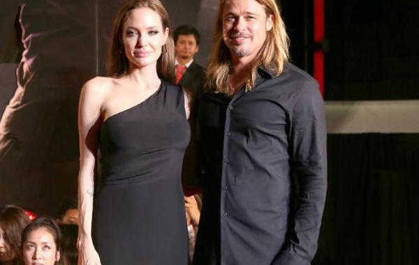 Angelina Jolie تتألق بالأسود في اليابان