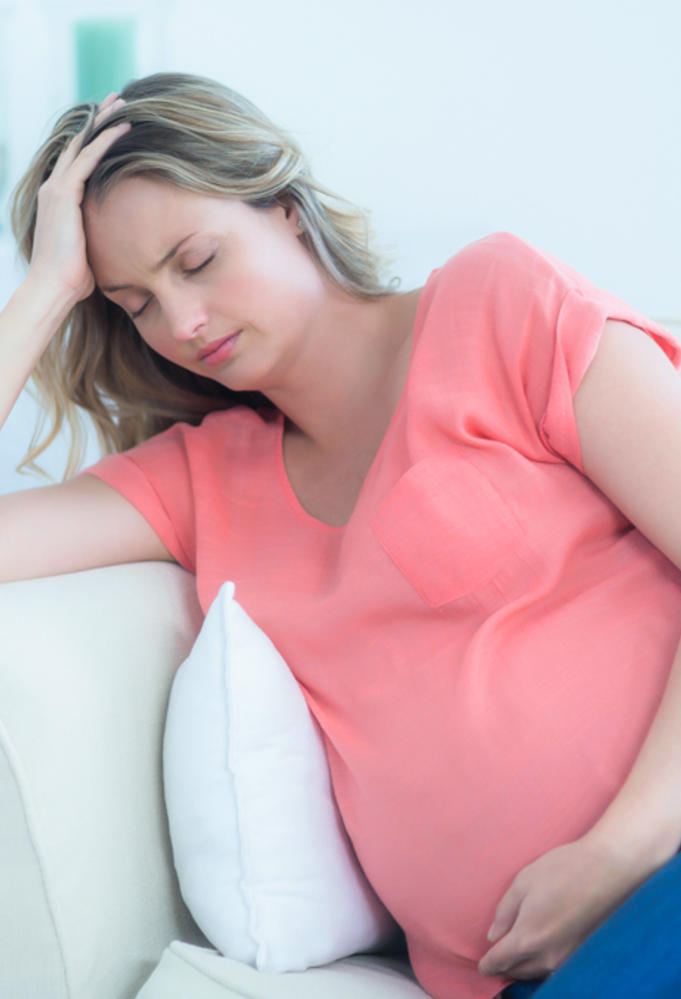 هل الصداع من اعراض الحمل